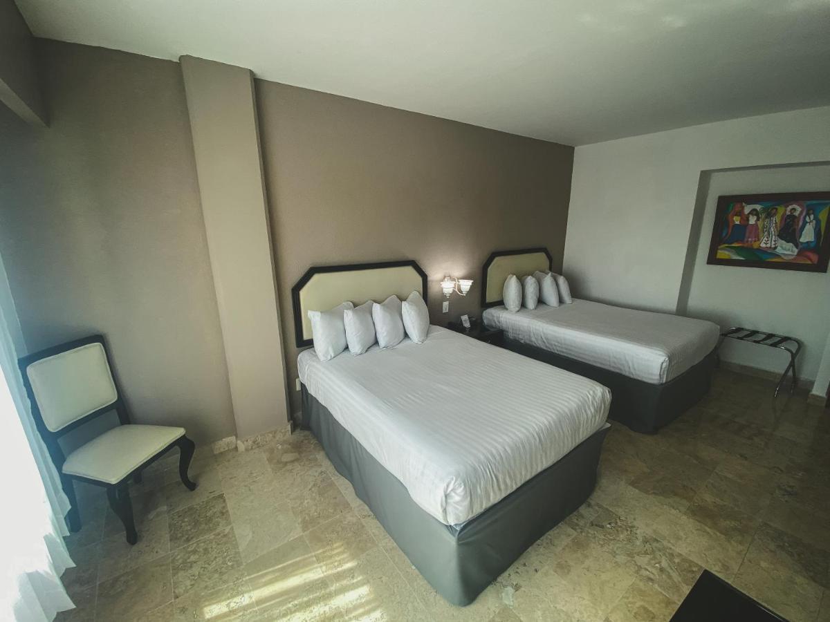 Отель Gran Tuxtepec Plaza Экстерьер фото