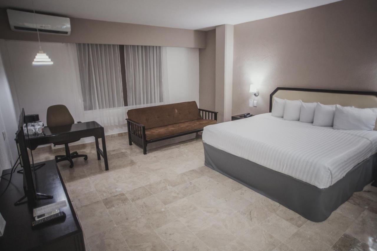 Отель Gran Tuxtepec Plaza Экстерьер фото