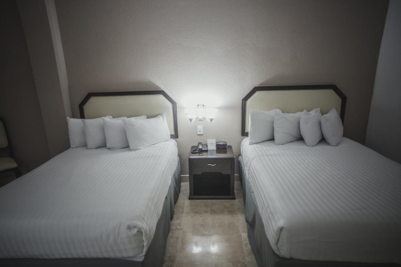 Отель Gran Tuxtepec Plaza Экстерьер фото