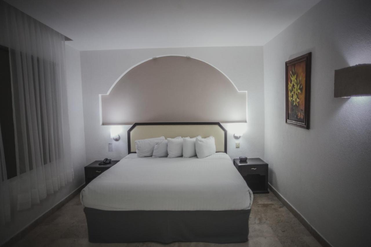 Отель Gran Tuxtepec Plaza Экстерьер фото