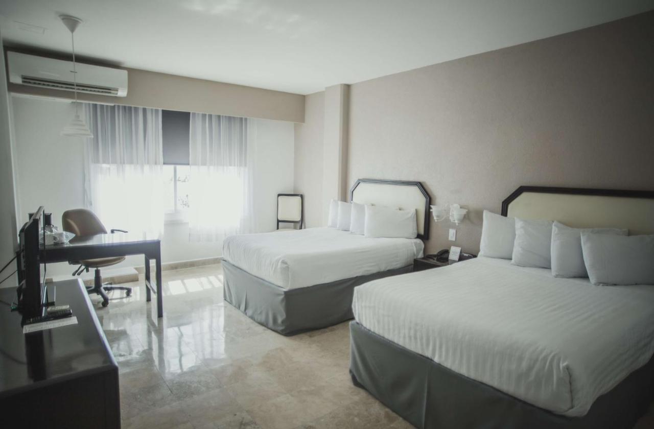 Отель Gran Tuxtepec Plaza Экстерьер фото