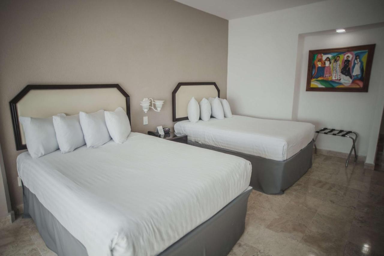 Отель Gran Tuxtepec Plaza Экстерьер фото