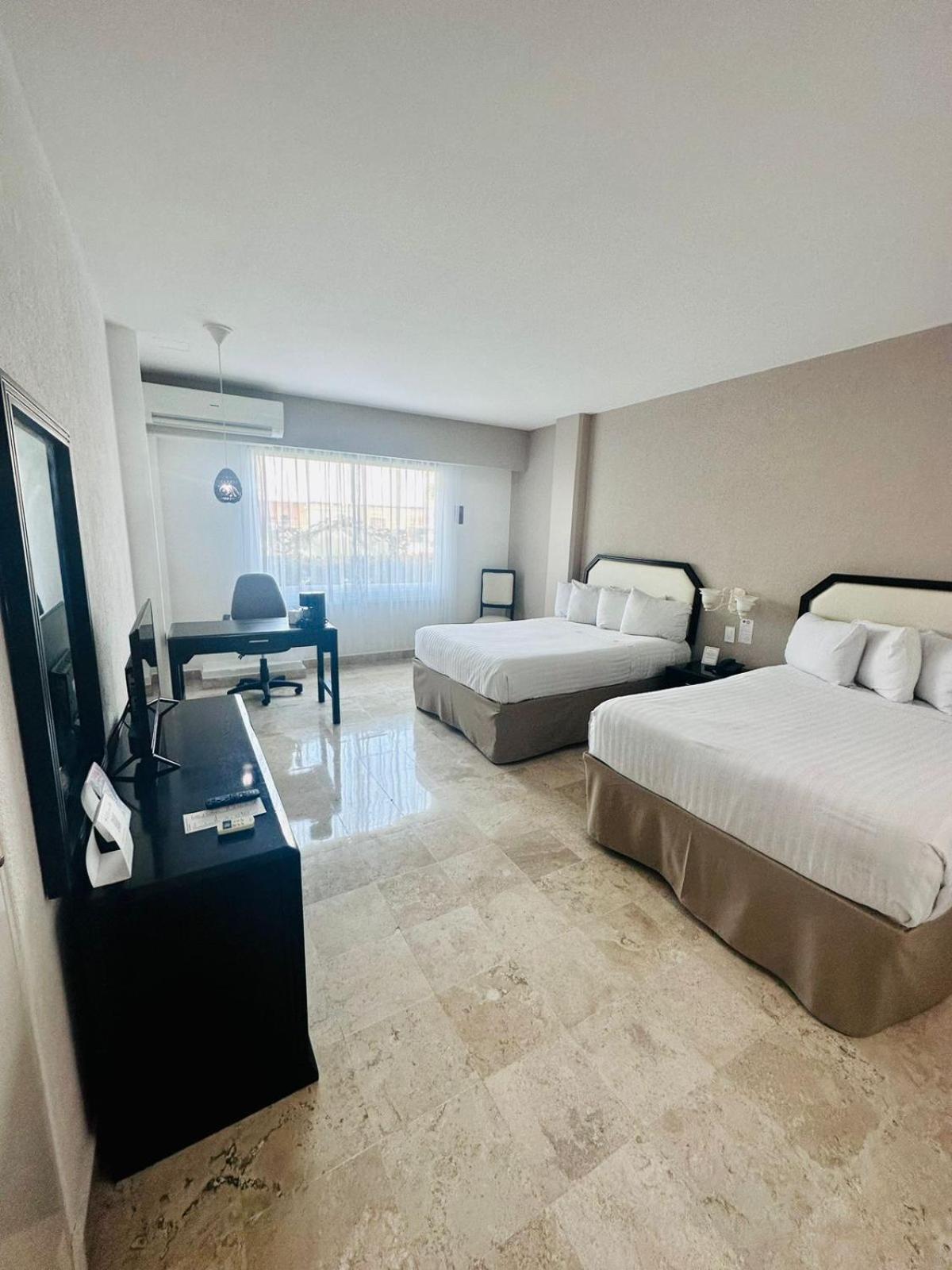 Отель Gran Tuxtepec Plaza Экстерьер фото
